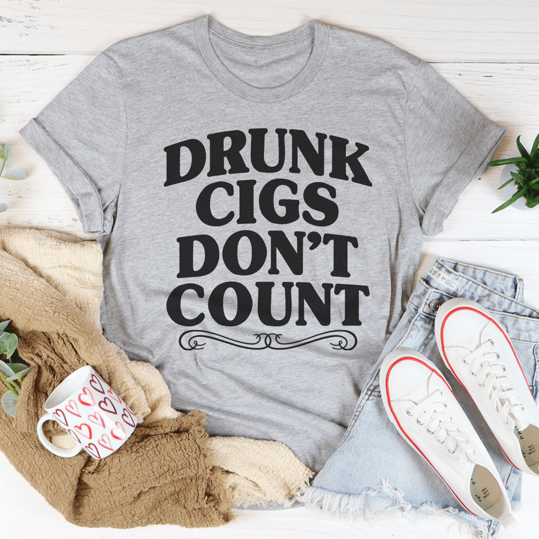 Drunk Cigs Don't Count T-Shirt displayed on a mannequin, showcasing its soft cotton fabric and vibrant print.