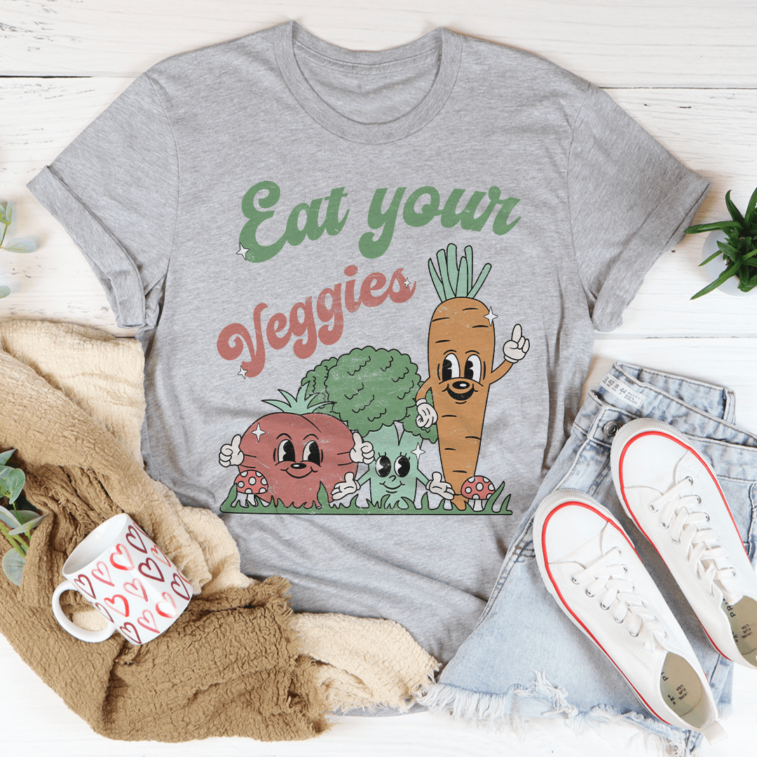 Eat Your Veggies T-Shirt made from soft ring-spun cotton, featuring double stitching for durability and a vibrant vegetable-themed print.