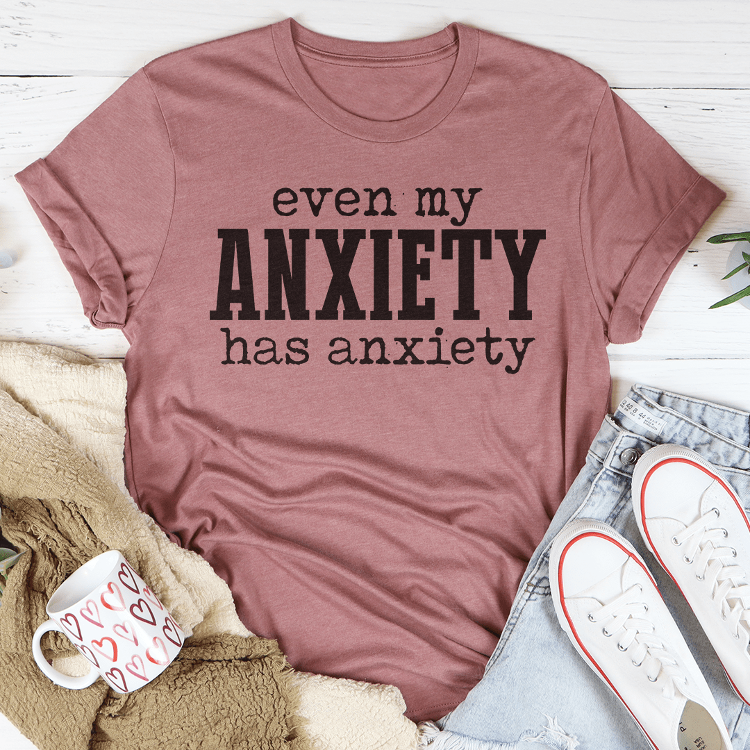 A comfortable and durable t-shirt featuring the phrase 'Even My Anxiety Has Anxiety' printed on it, made from soft ring-spun cotton.