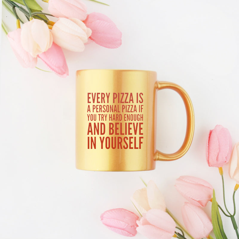 Ceramic mug with motivational pizza design and gold metallic coating, perfect for beverages.