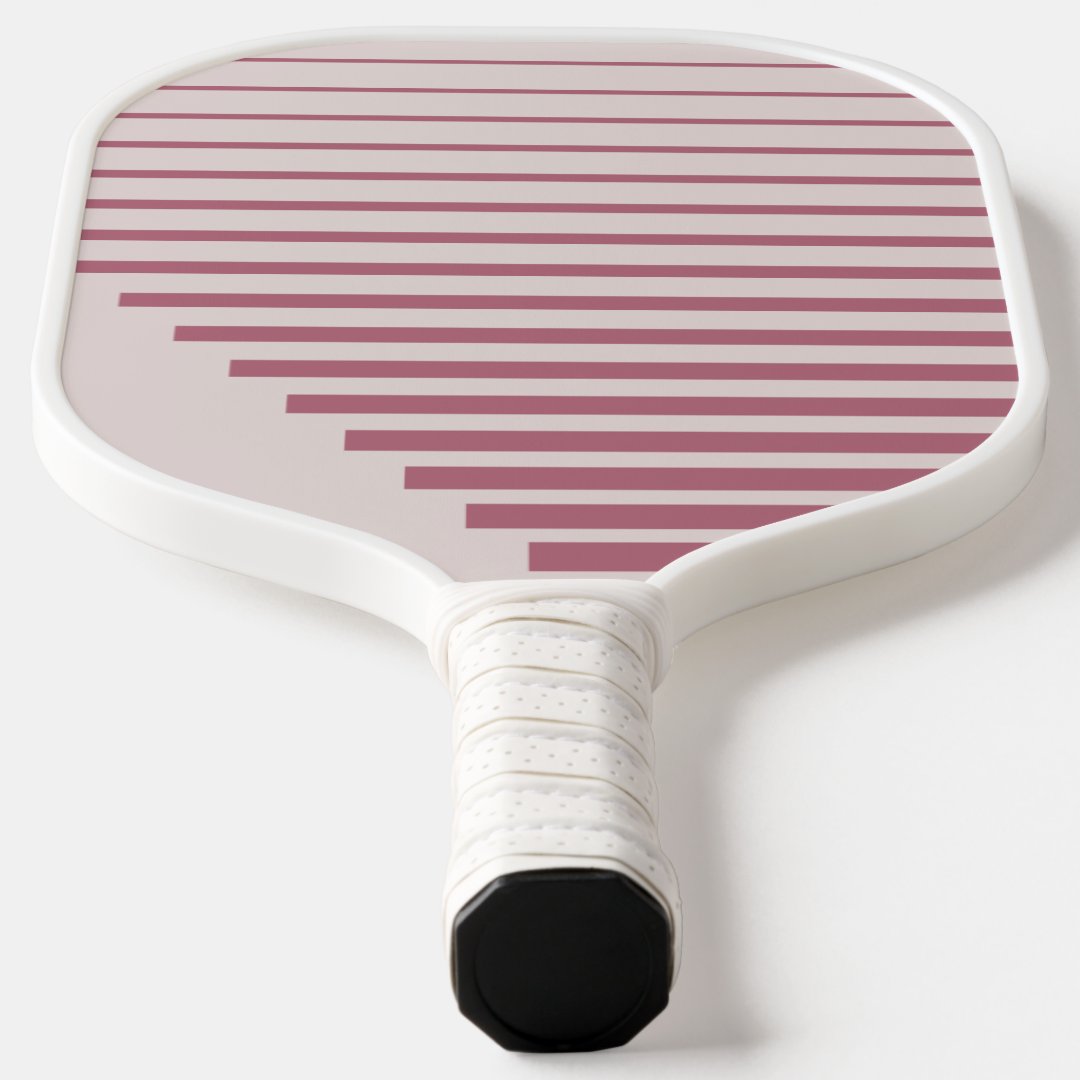 Fresh Wave Pickleball Paddle featuring a vibrant geometric design with stripes and blocks, showcasing its high-quality materials and comfortable grip.