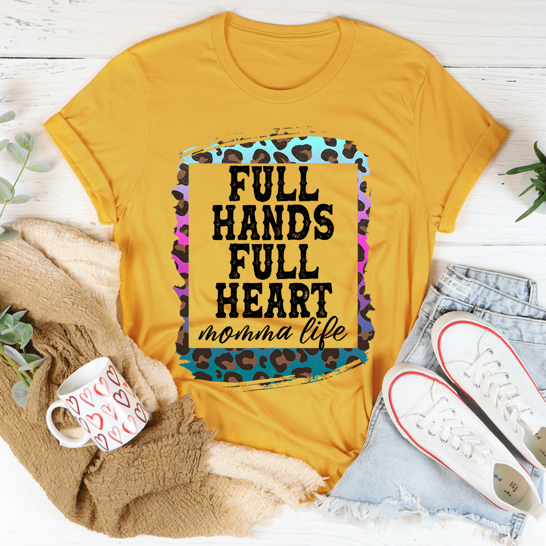 Full Hands Full Heart Tee in various colors, showcasing its soft cotton fabric and durable stitching.