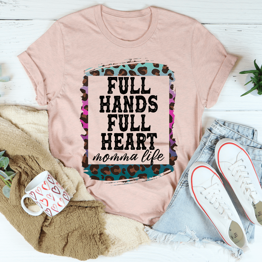 Full Hands Full Heart Tee in various colors, showcasing its soft cotton fabric and durable stitching.