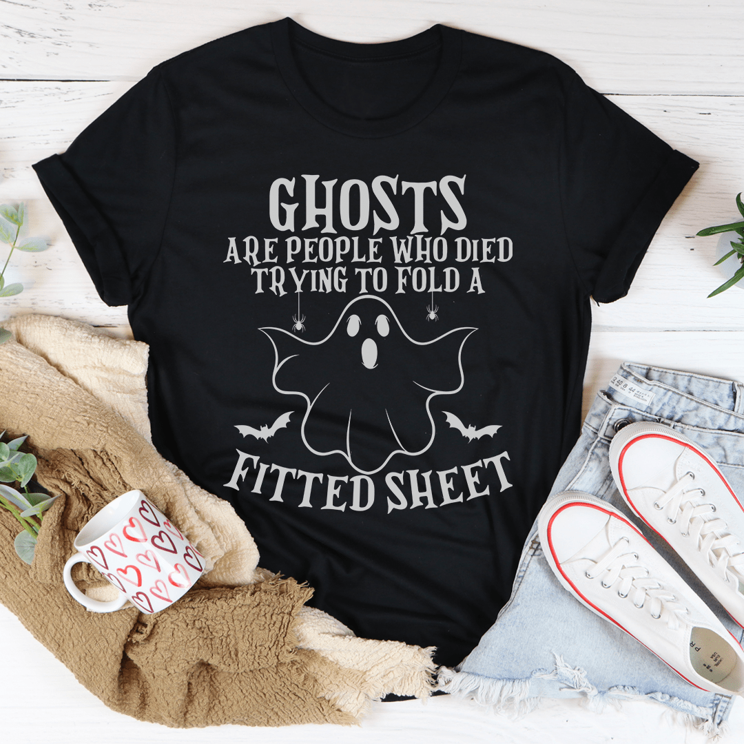 A comfortable t-shirt featuring the phrase 'Ghosts Are For People Who Tried To Fold A Fitted Sheet', made from soft ring-spun cotton.