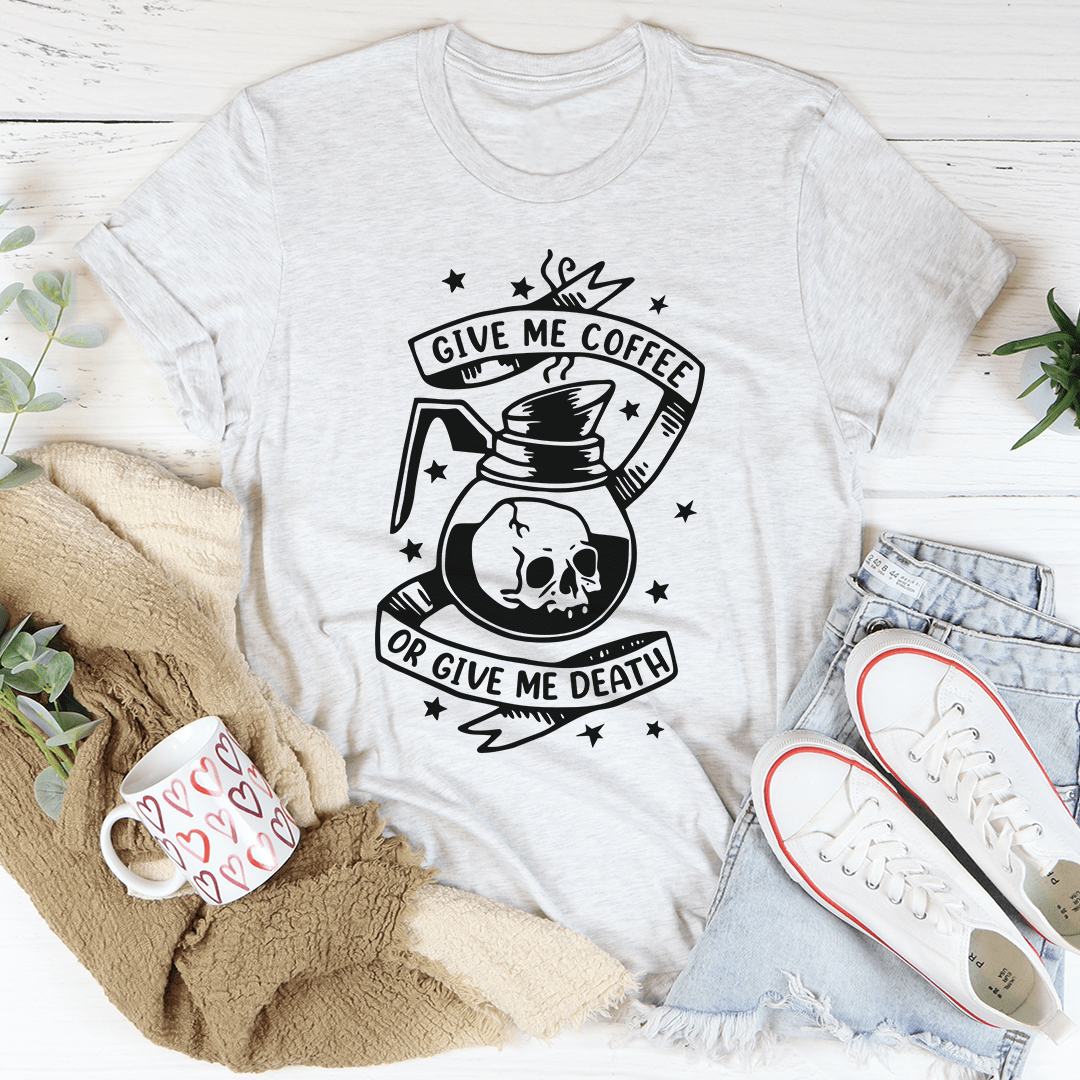 A stylish 'Give Me Coffee Or Give Me Death' T-Shirt made from soft cotton, featuring a humorous coffee-themed graphic.