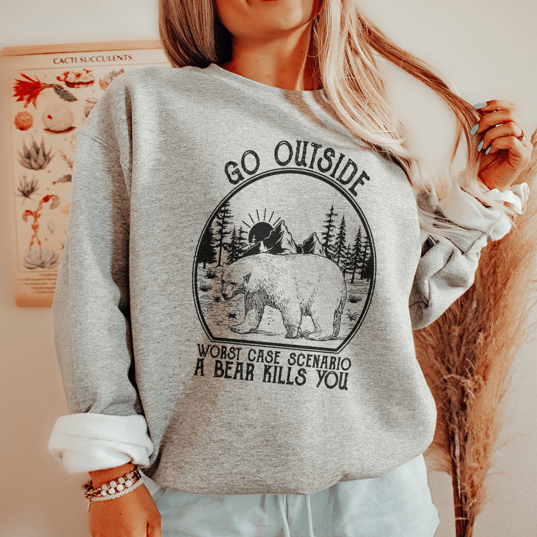 Cozy hoodie featuring a unique bear-themed design, made from cotton/poly fleece blend, perfect for outdoor adventures.