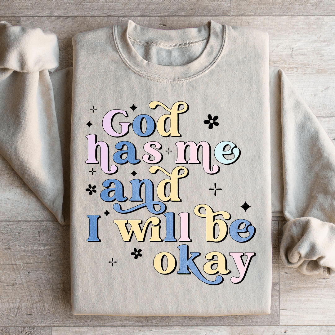 Cozy 'God Has Me And I Will Be Okay' sweats featuring a unique design by top artists, made from a warm cotton/poly fleece blend.