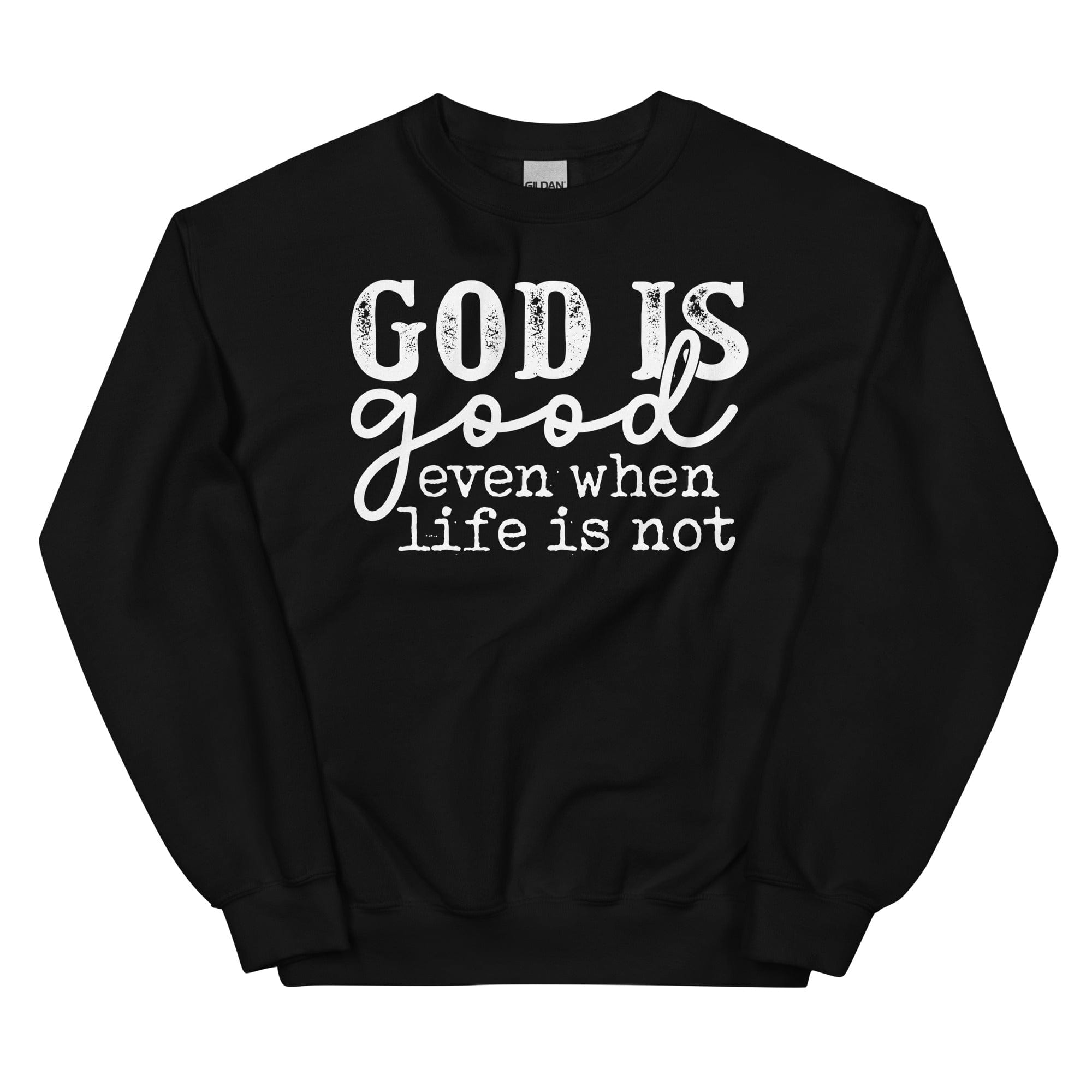 A cozy hoodie featuring the phrase 'God Is Good Even When Life Is Not', designed by top artists, showcasing a unique and stylish look.