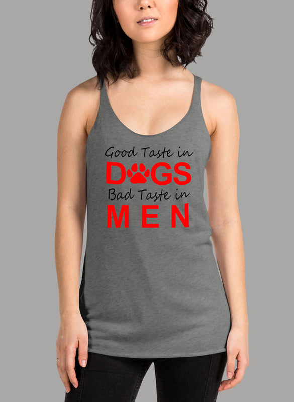 Black women's tank top featuring 'Good Taste In Dogs' design, racer back style, and curved hem for comfort.