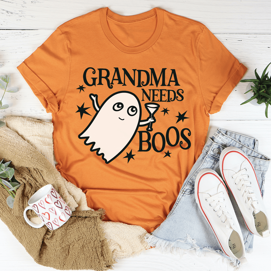 A comfortable Grandma Needs Boos Tee made from soft ring-spun cotton, featuring double stitching for durability and a fun design.