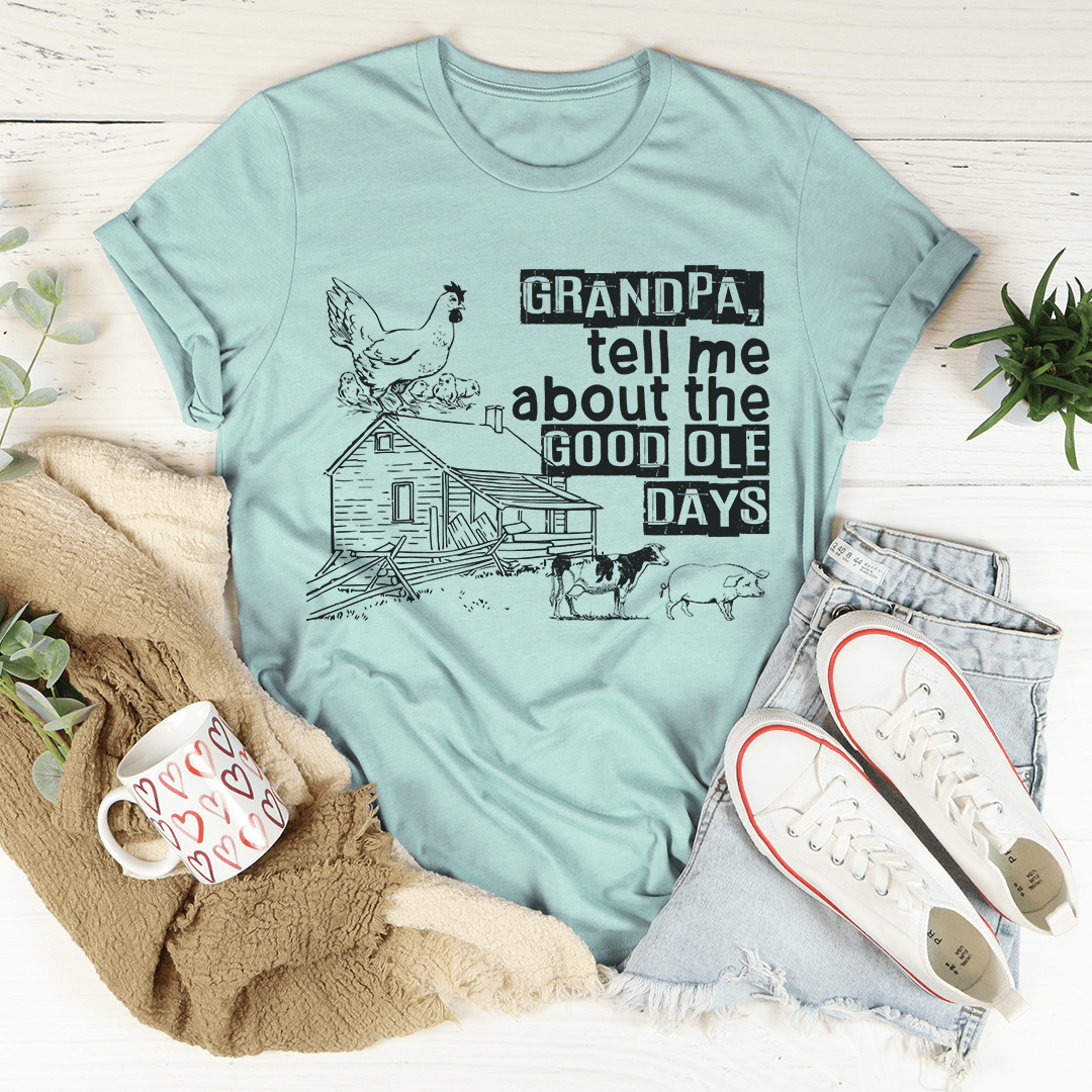 A comfortable and stylish t-shirt featuring the phrase 'Grandpa Tell Me About The Good Ole Days', made from soft ring-spun cotton.