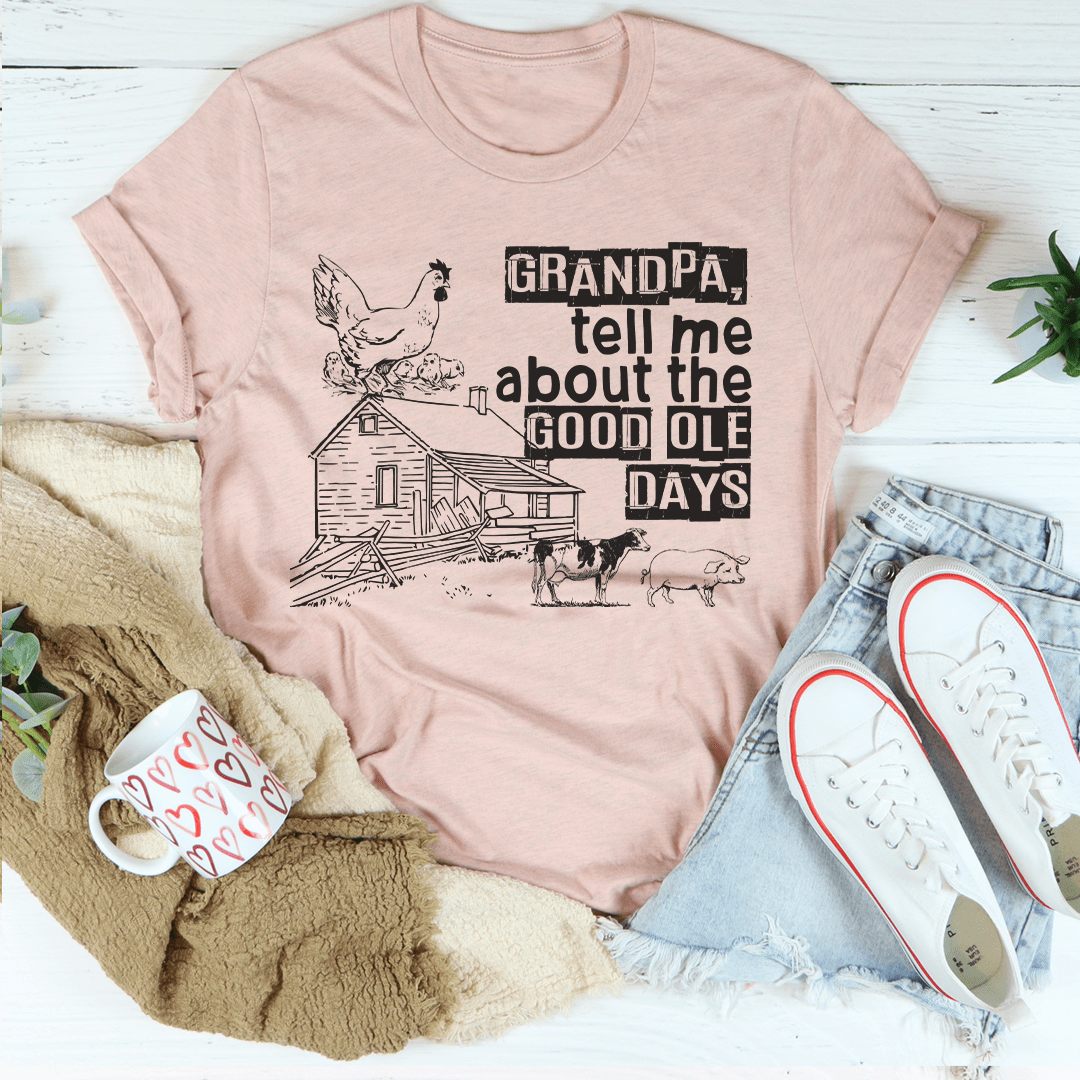 A comfortable and stylish t-shirt featuring the phrase 'Grandpa Tell Me About The Good Ole Days', made from soft ring-spun cotton.