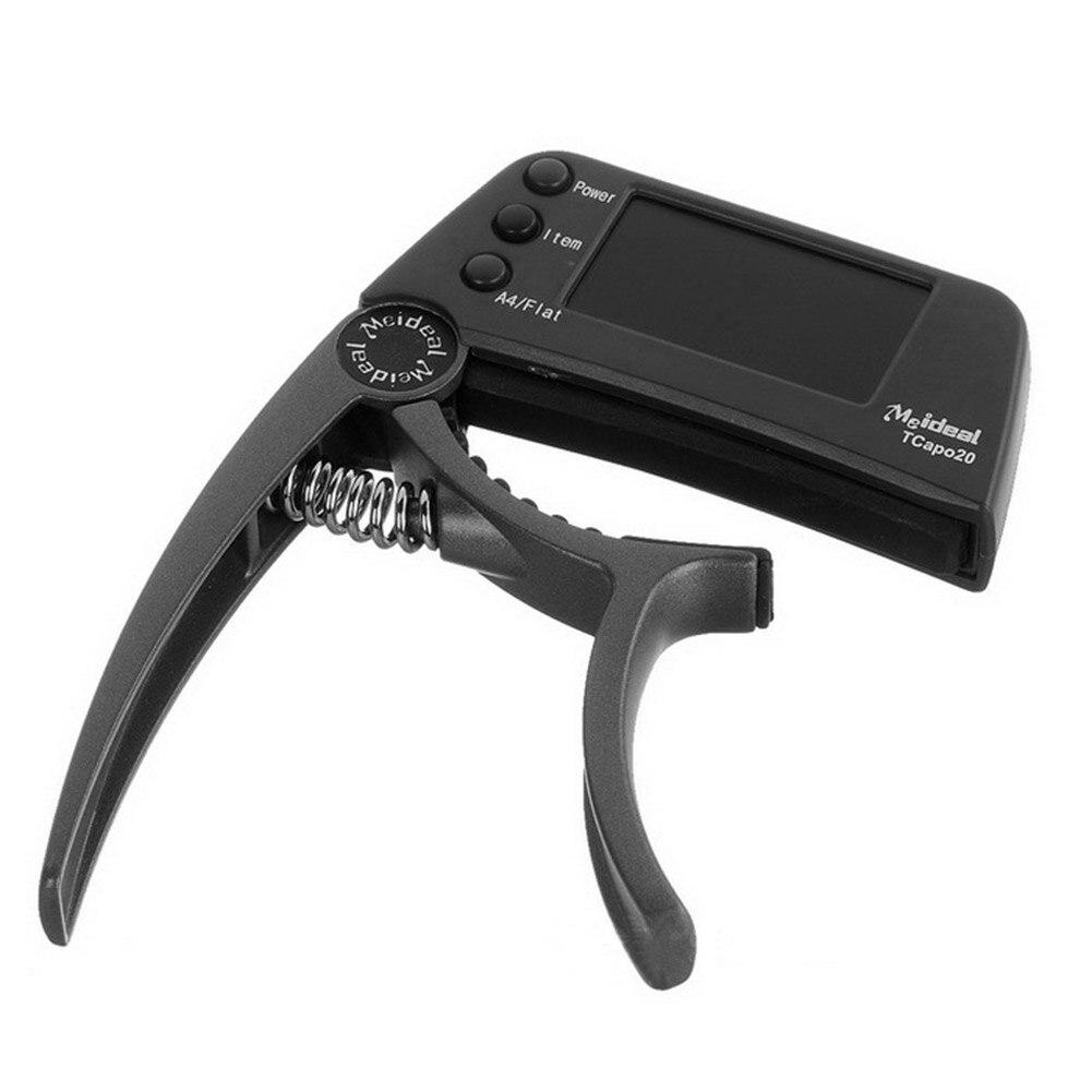 Guitar Tuner Capo 2 in 1, a compact device for tuning and capo functionality, suitable for guitar, bass, and violin.