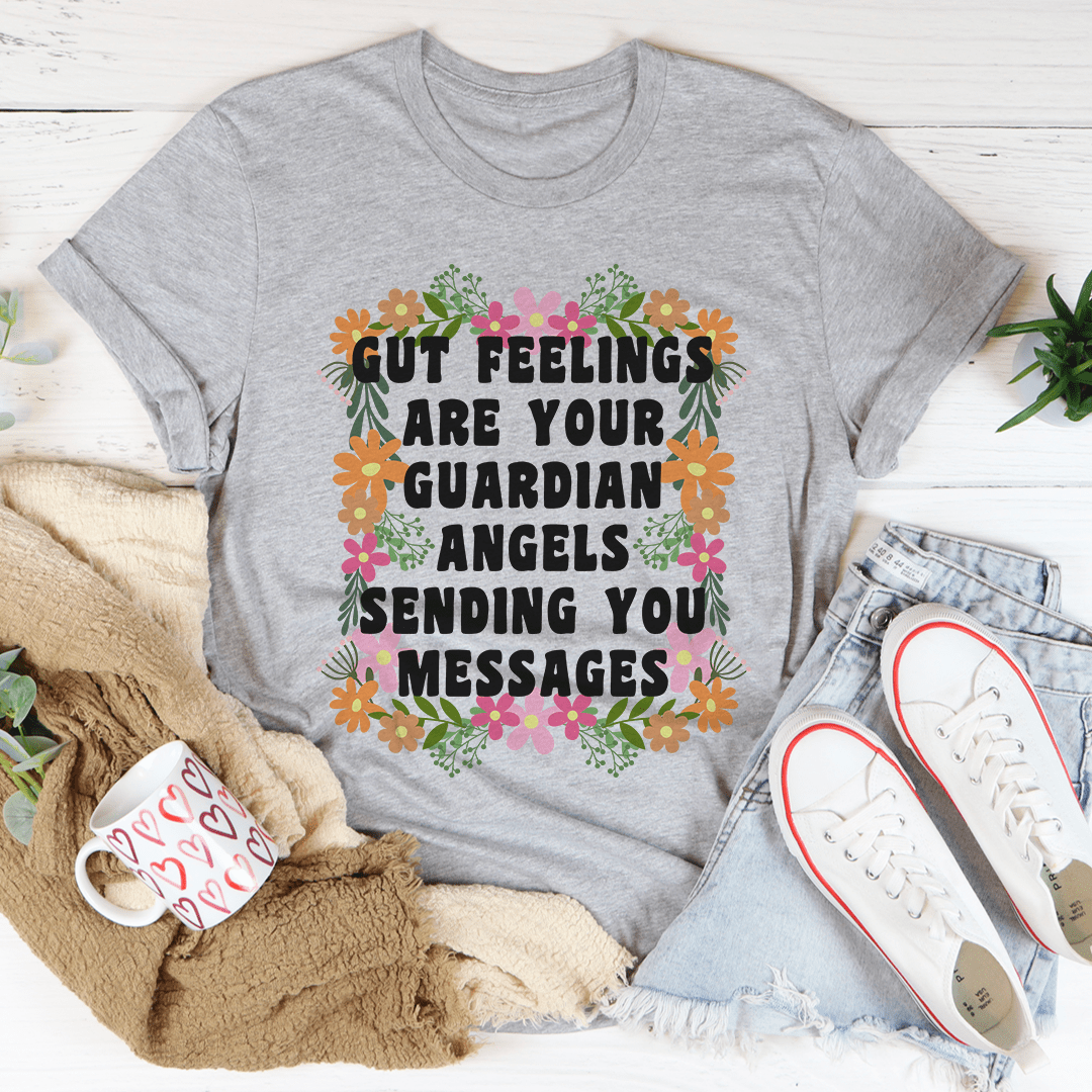 Gut Feelings Are Your Guardian Angels Tee in soft cotton, featuring double stitching and a unique inspirational print.