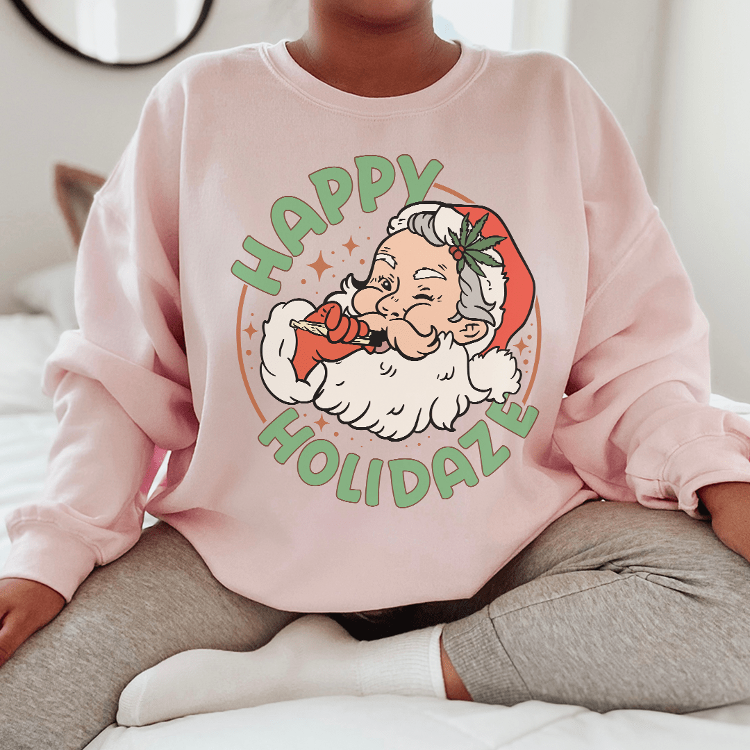 Happy Holidaze sweats featuring unique designs by top artists, made from cozy cotton/poly fleece blend.