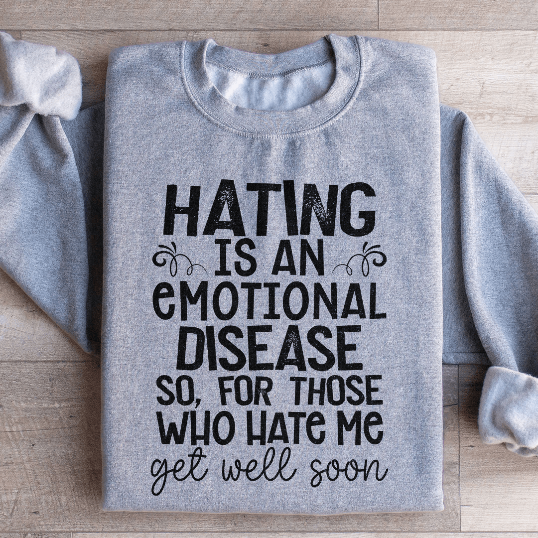 Cozy 'Hating Is An Emotional Disease' sweats featuring a cotton/poly fleece blend, designed by top artists for ultimate comfort.