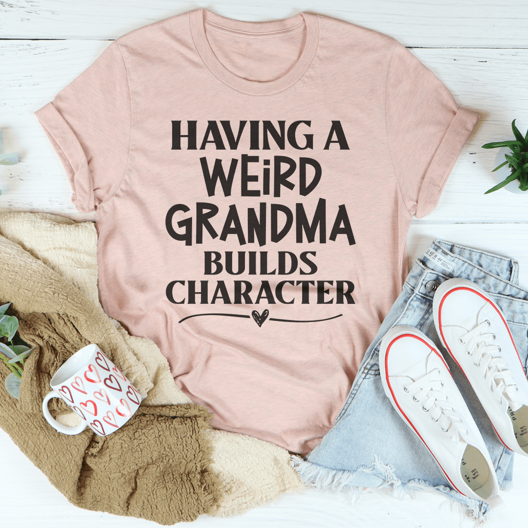 A stylish t-shirt featuring the phrase 'Having A Weird Grandma Builds Character' printed on it, showcasing its soft fabric and durable stitching.