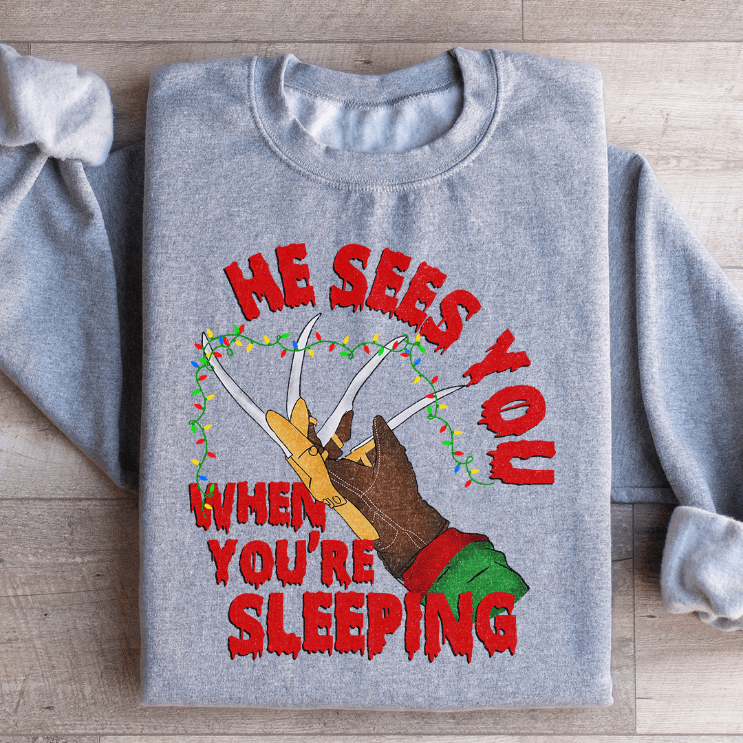 Cozy 'He Sees You When You're Sleeping' sweats featuring a unique design by top artists, made from soft cotton/poly fleece blend.