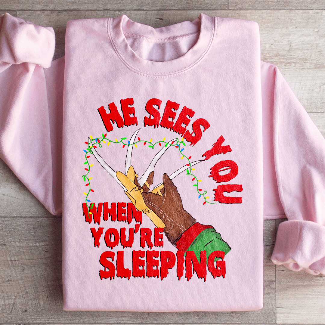 Cozy 'He Sees You When You're Sleeping' sweats featuring a unique design by top artists, made from soft cotton/poly fleece blend.