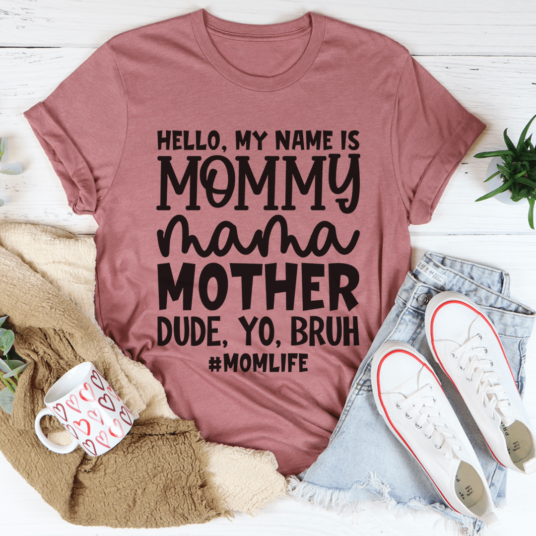 A stylish Hello My Name Is Mommy Tee made of soft cotton, featuring a playful design perfect for moms.