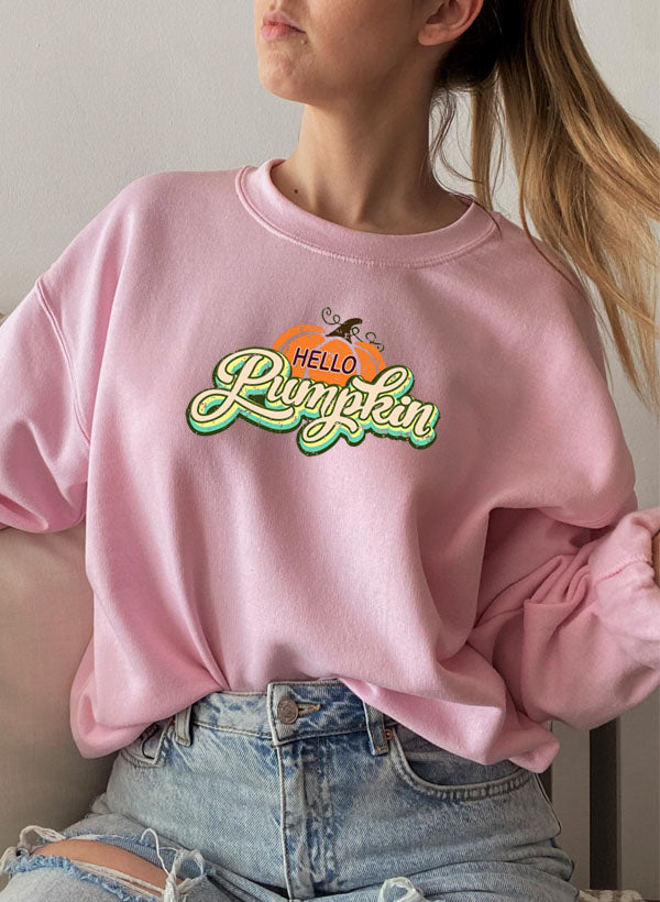 Hello Pumpkin Sweat Shirt featuring a cozy fleece lining and adjustable cuffs, perfect for autumn wear.