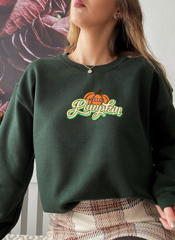 Hello Pumpkin Sweat Shirt featuring a cozy fleece lining and adjustable cuffs, perfect for autumn wear.