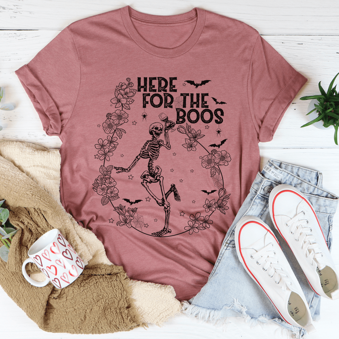 Here For The Boos Wine Tee featuring a playful wine-themed design on a soft cotton fabric.