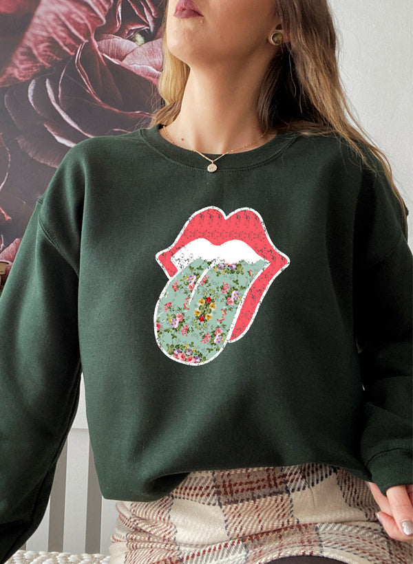 Hippie Floral Tongue Sweat Shirt featuring a vibrant floral design on a cozy fleece fabric.