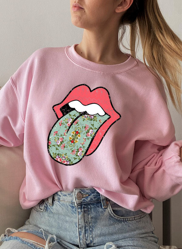 Hippie Floral Tongue Sweat Shirt featuring a vibrant floral design on a cozy fleece fabric.