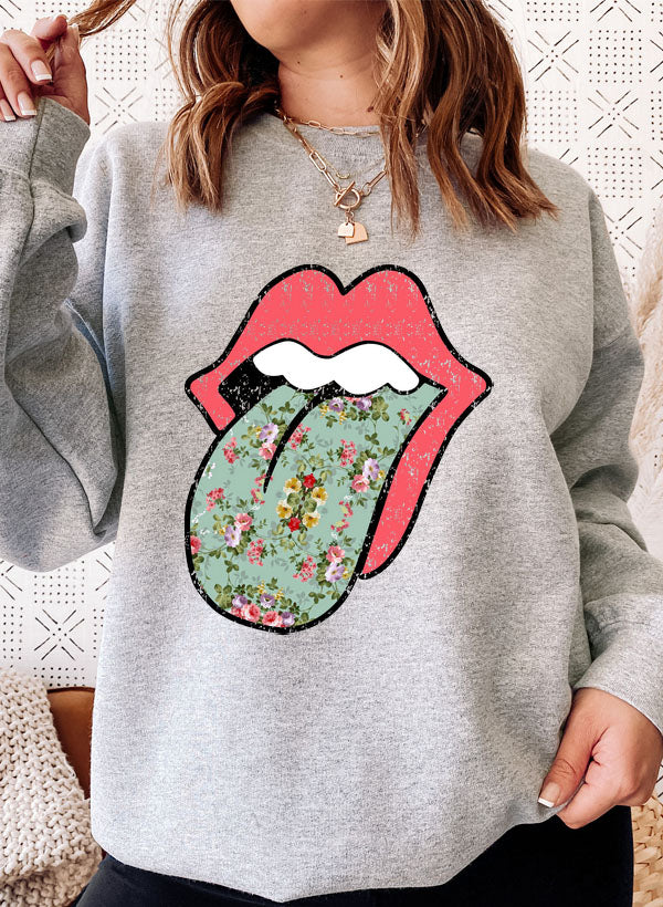 Hippie Floral Tongue Sweat Shirt featuring a vibrant floral design on a cozy fleece fabric.