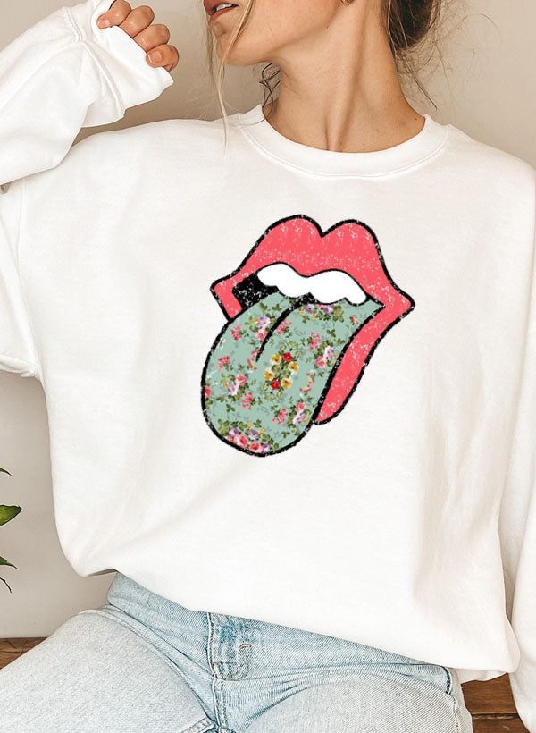 Hippie Floral Tongue Sweat Shirt featuring a vibrant floral design on a cozy fleece fabric.