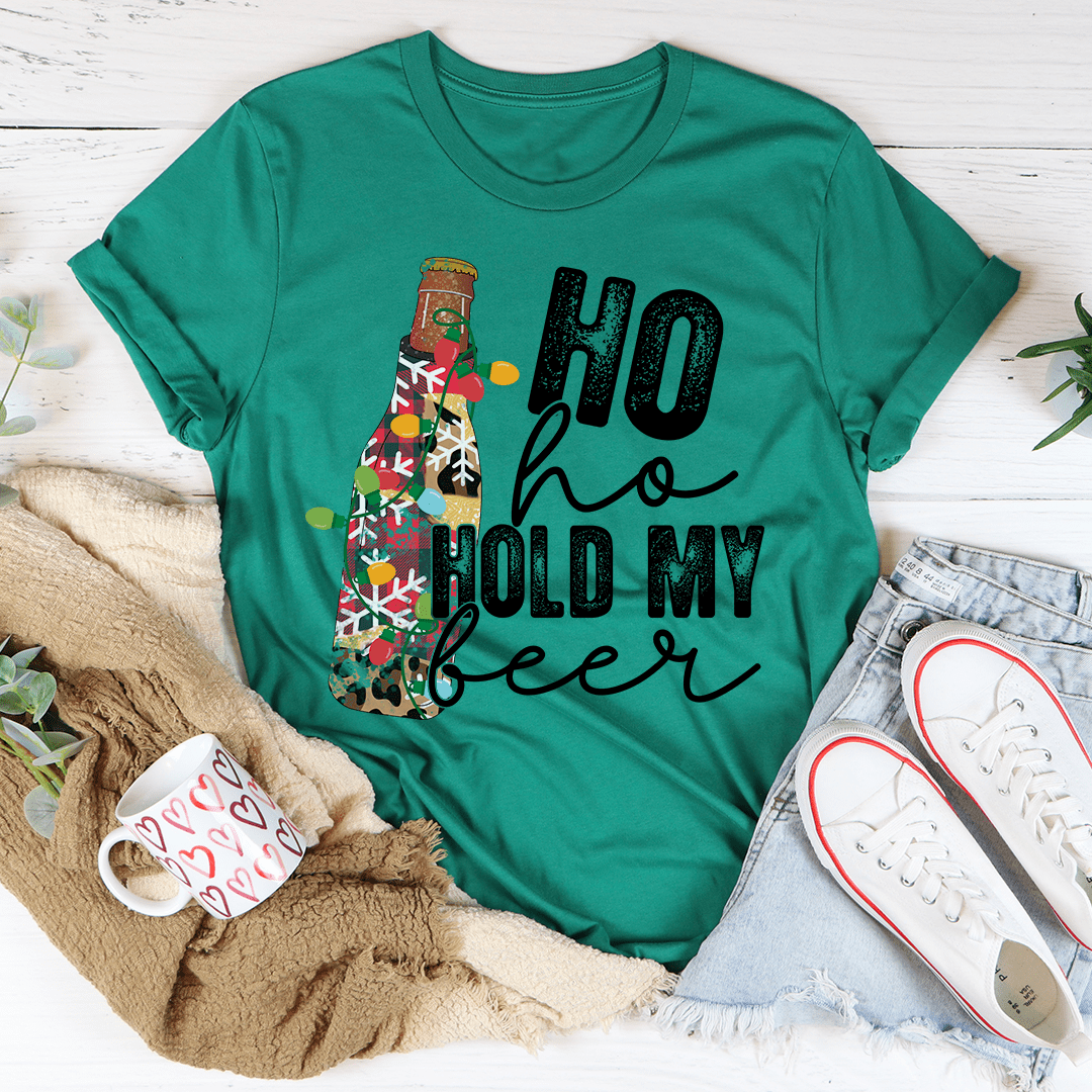 Ho Ho Hold My Beer T-Shirt in various colors, showcasing its soft cotton fabric and durable stitching.