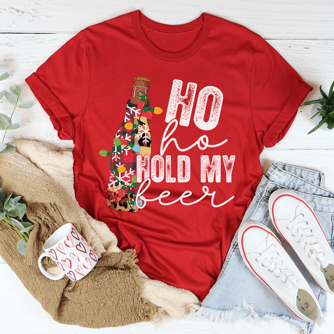 Ho Ho Hold My Beer T-Shirt in various colors, showcasing its soft cotton fabric and durable stitching.