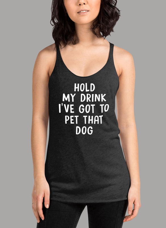 A stylish women's tank top featuring the phrase 'Hold My Drink I've Got To Pet That Dog', designed for comfort and active lifestyles.