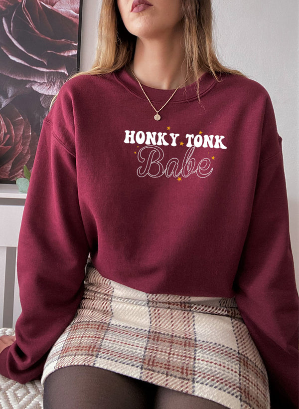 Honky Tonk Babe Sweat Shirt featuring a cozy fleece lining and adjustable cuffs, designed for comfort and style.