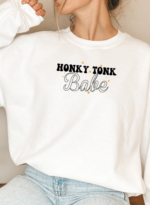 Honky Tonk Babe Sweat Shirt featuring a cozy fleece lining and adjustable cuffs, designed for comfort and style.