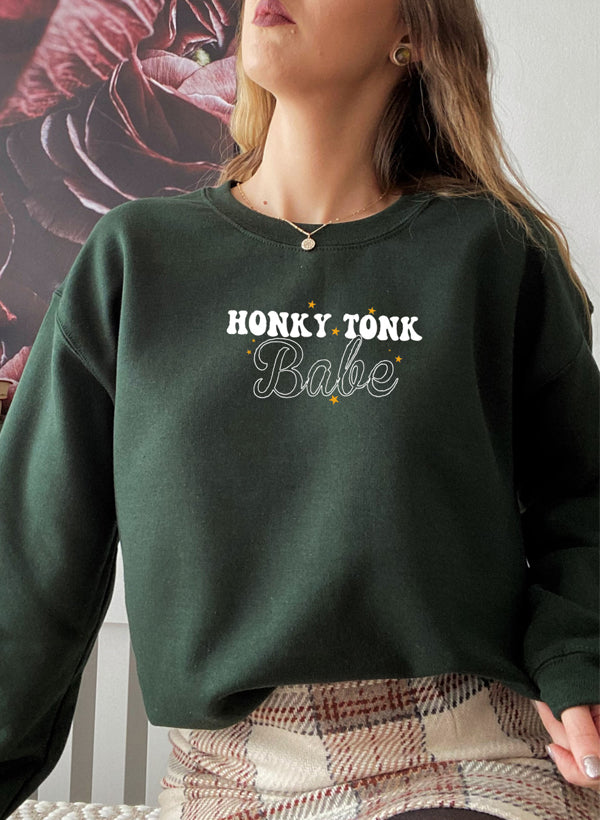 Honky Tonk Babe Sweat Shirt featuring a cozy fleece lining and adjustable cuffs, designed for comfort and style.