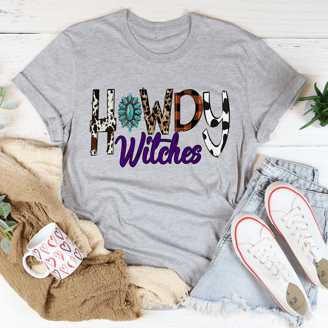 A stylish Howdy Witches Tee made from soft ring-spun cotton, featuring double stitching for durability and a comfortable fit.