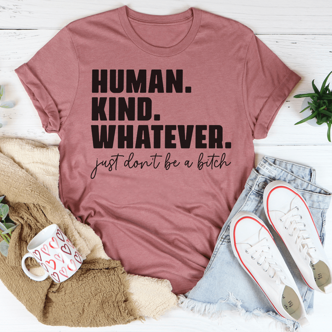 Human Kind Whatever T-Shirt displayed on a mannequin, showcasing its soft cotton fabric and stylish design.