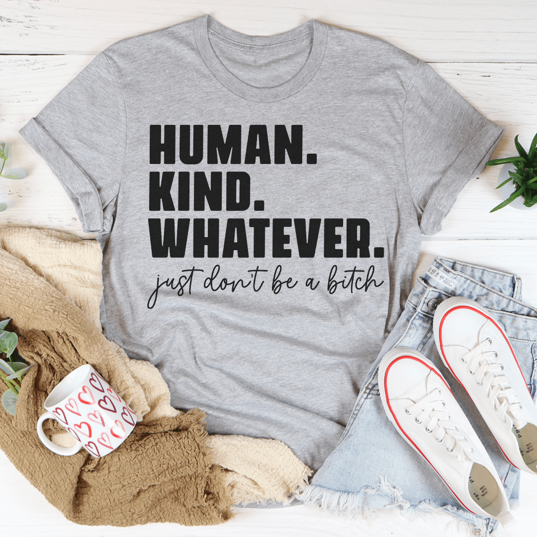 Human Kind Whatever T-Shirt displayed on a mannequin, showcasing its soft cotton fabric and stylish design.