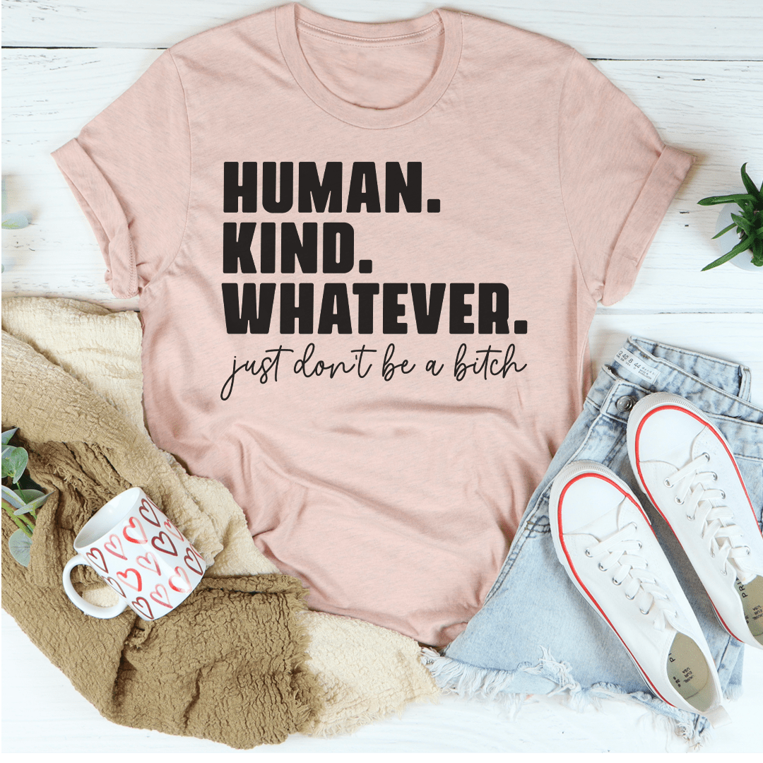 Human Kind Whatever T-Shirt displayed on a mannequin, showcasing its soft cotton fabric and stylish design.