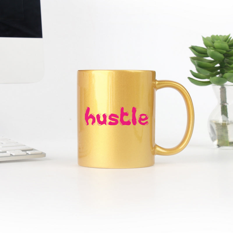 Hustle Gold & Silver Mug featuring a luxurious metallic finish and elegant design, perfect for coffee or tea.