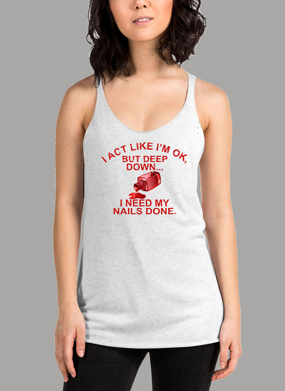 I Act Like I'm Ok But Deep Down I Need My Nails Done Women's Tank Top in a stylish racer back design, showcasing its comfortable fit and vibrant color.