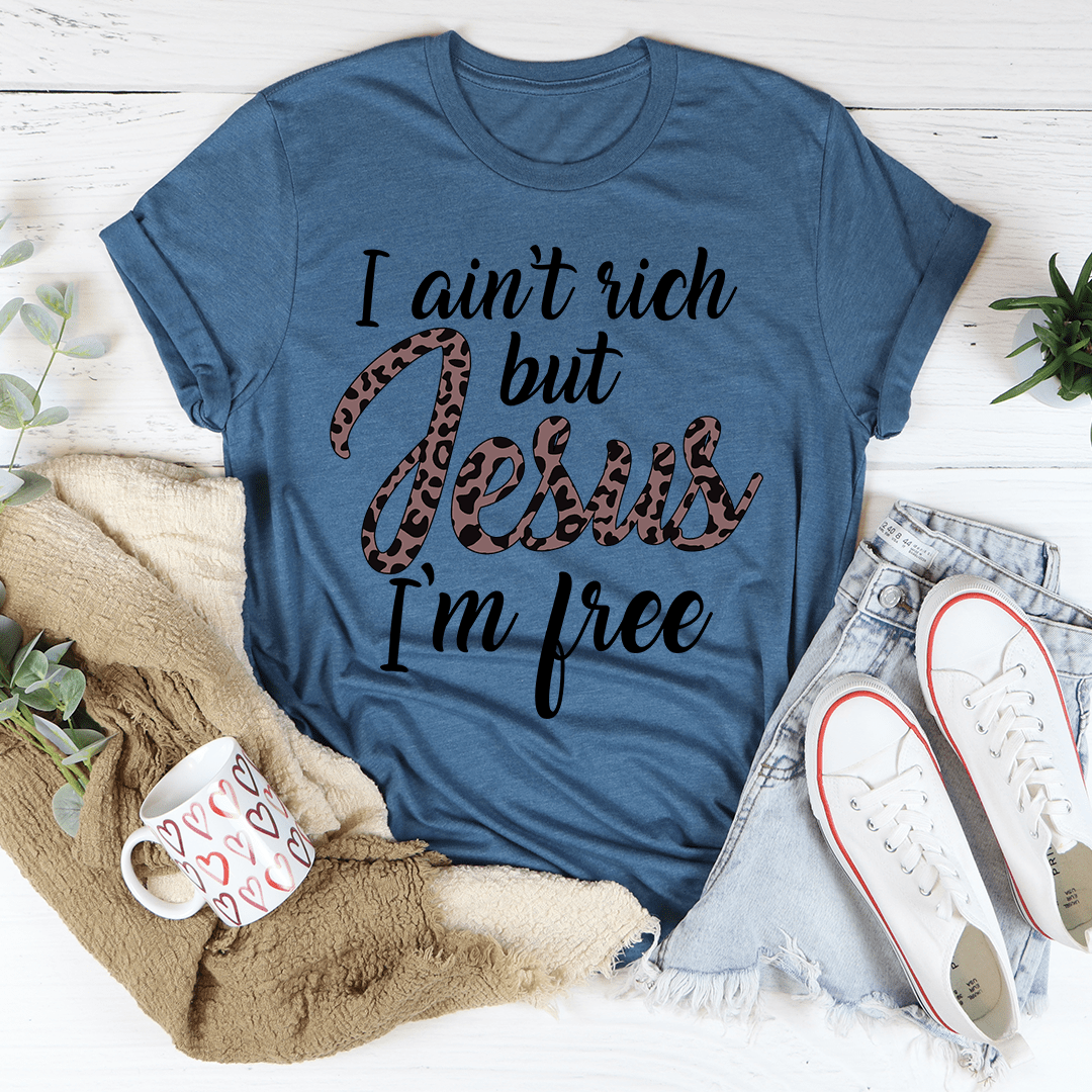 I Ain't Rich But Jesus I'm Free Tee, featuring a bold statement design on a soft, durable cotton fabric.