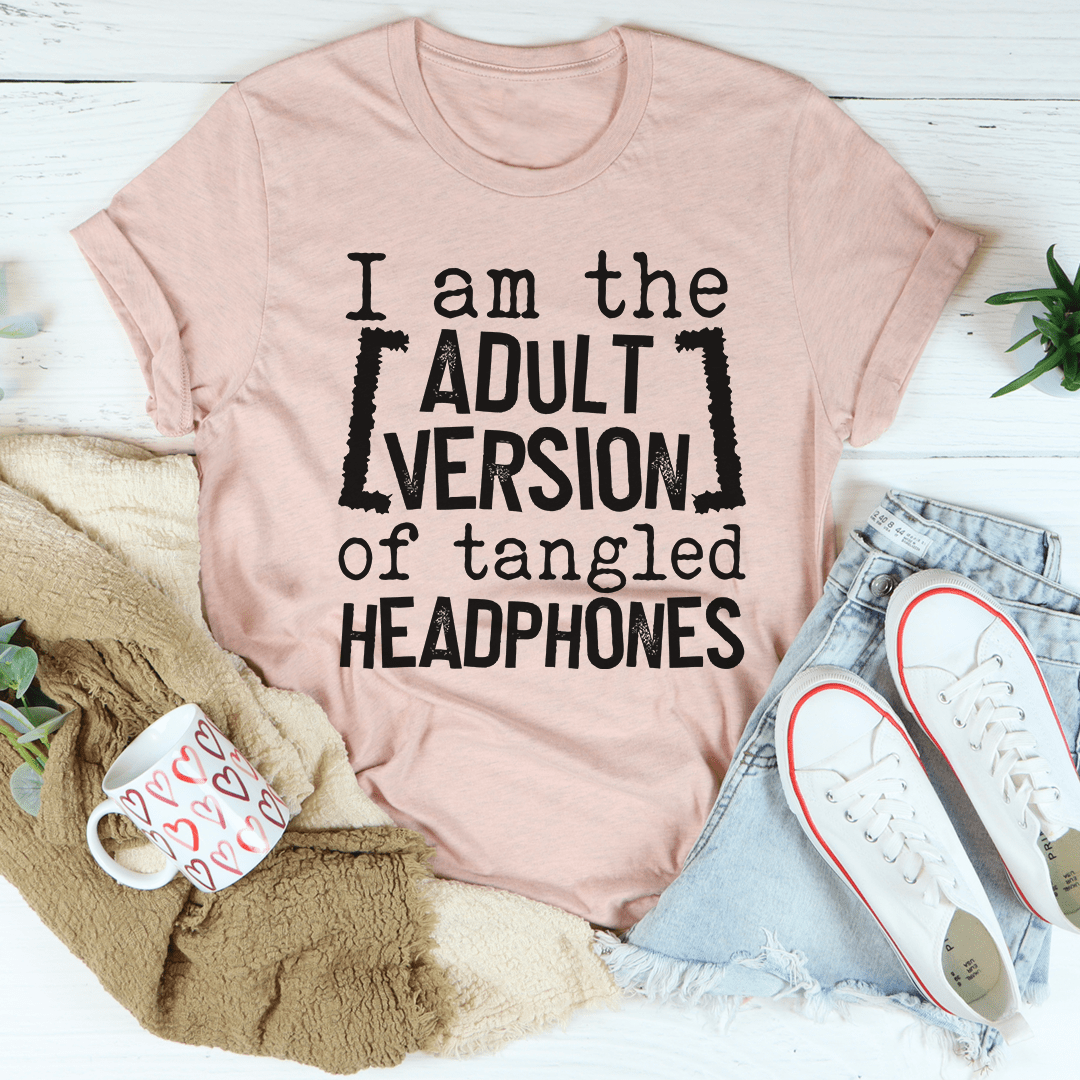 I Am The Adult Version Of Tangled Headphones T-Shirt displayed on a mannequin, showcasing its soft cotton fabric and stylish design.