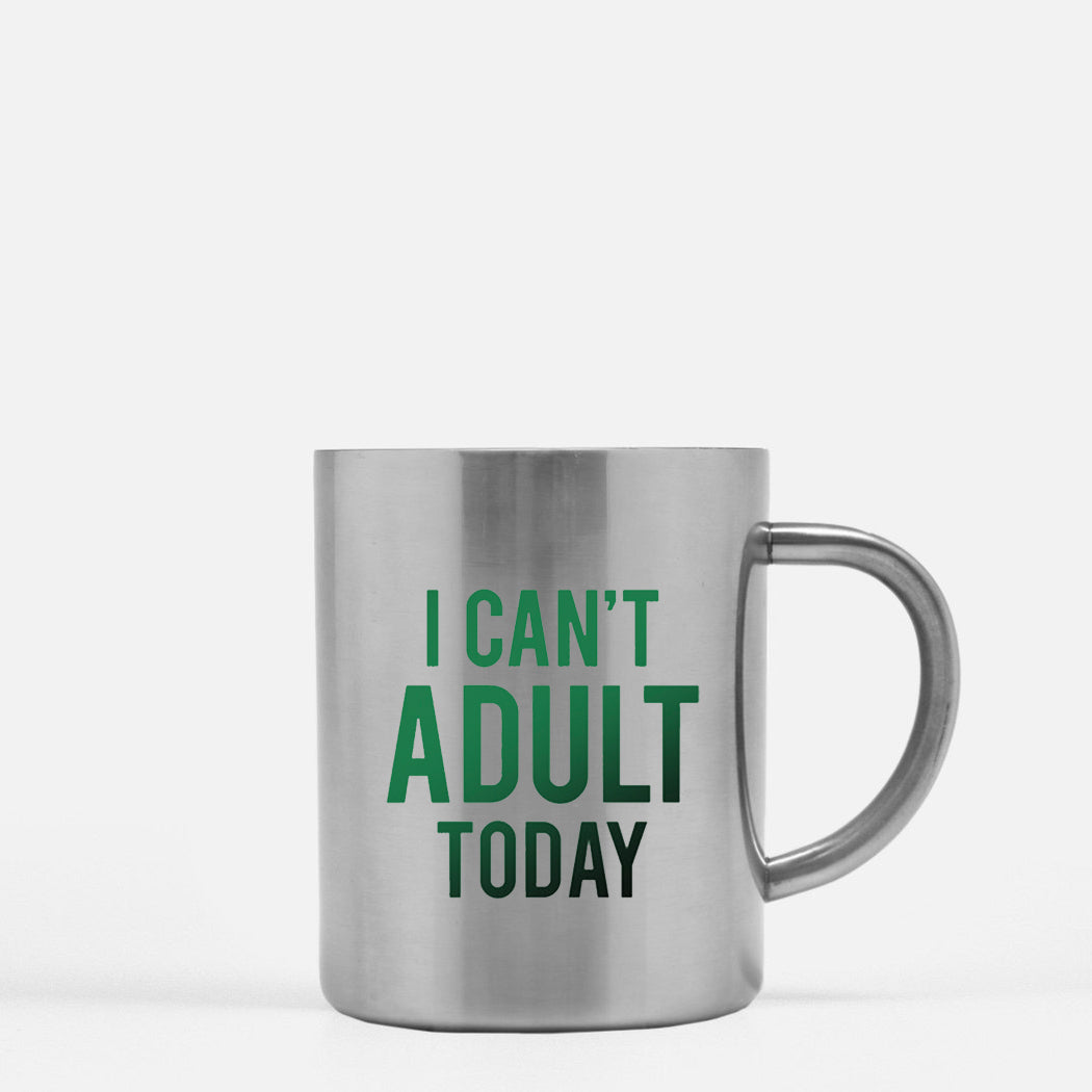 Ceramic mug with gold and silver design featuring the phrase 'I Can't Adult', perfect for coffee or tea.