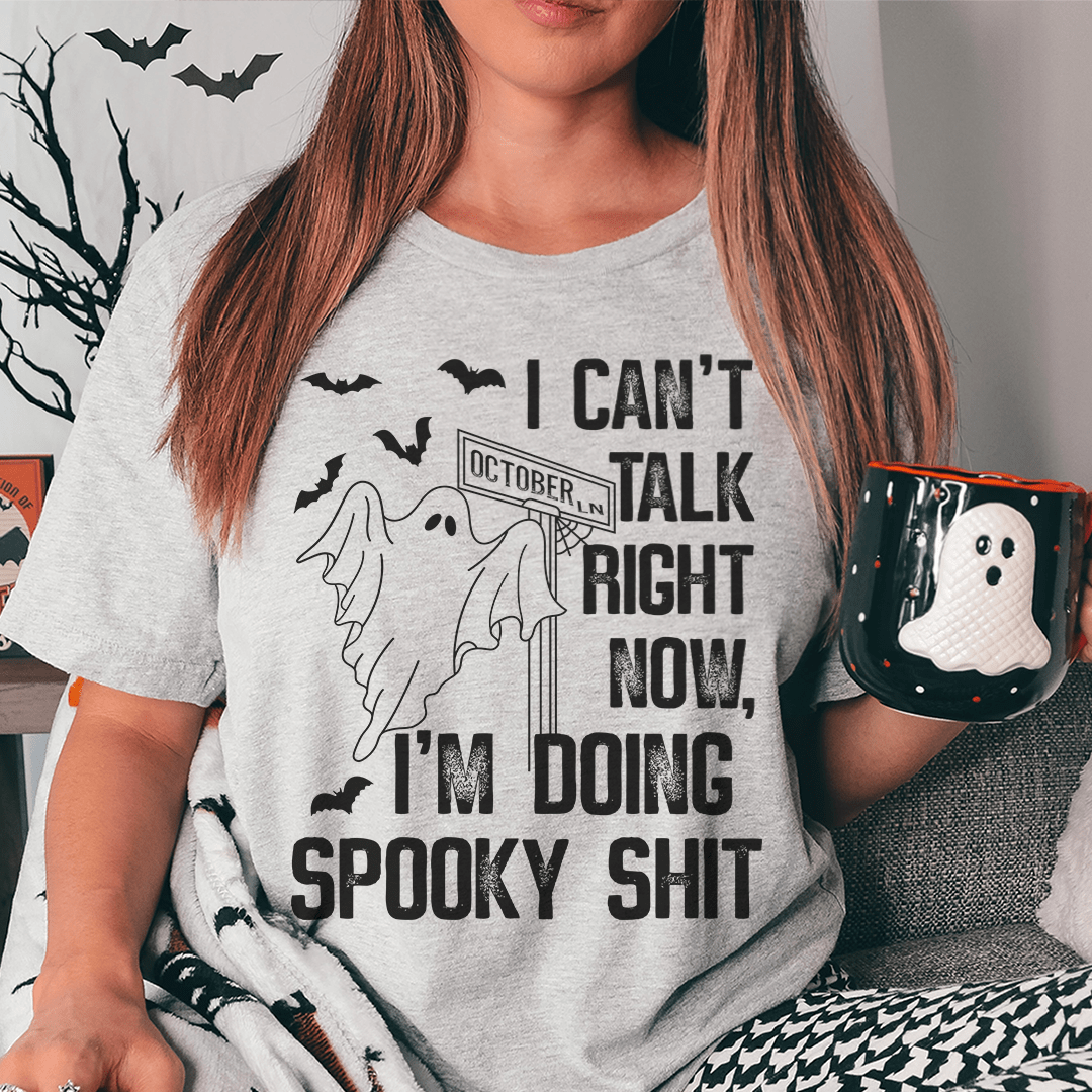 I Can't Talk Right Now Spooky T-Shirt featuring a spooky design on soft cotton fabric, perfect for Halloween or casual wear.