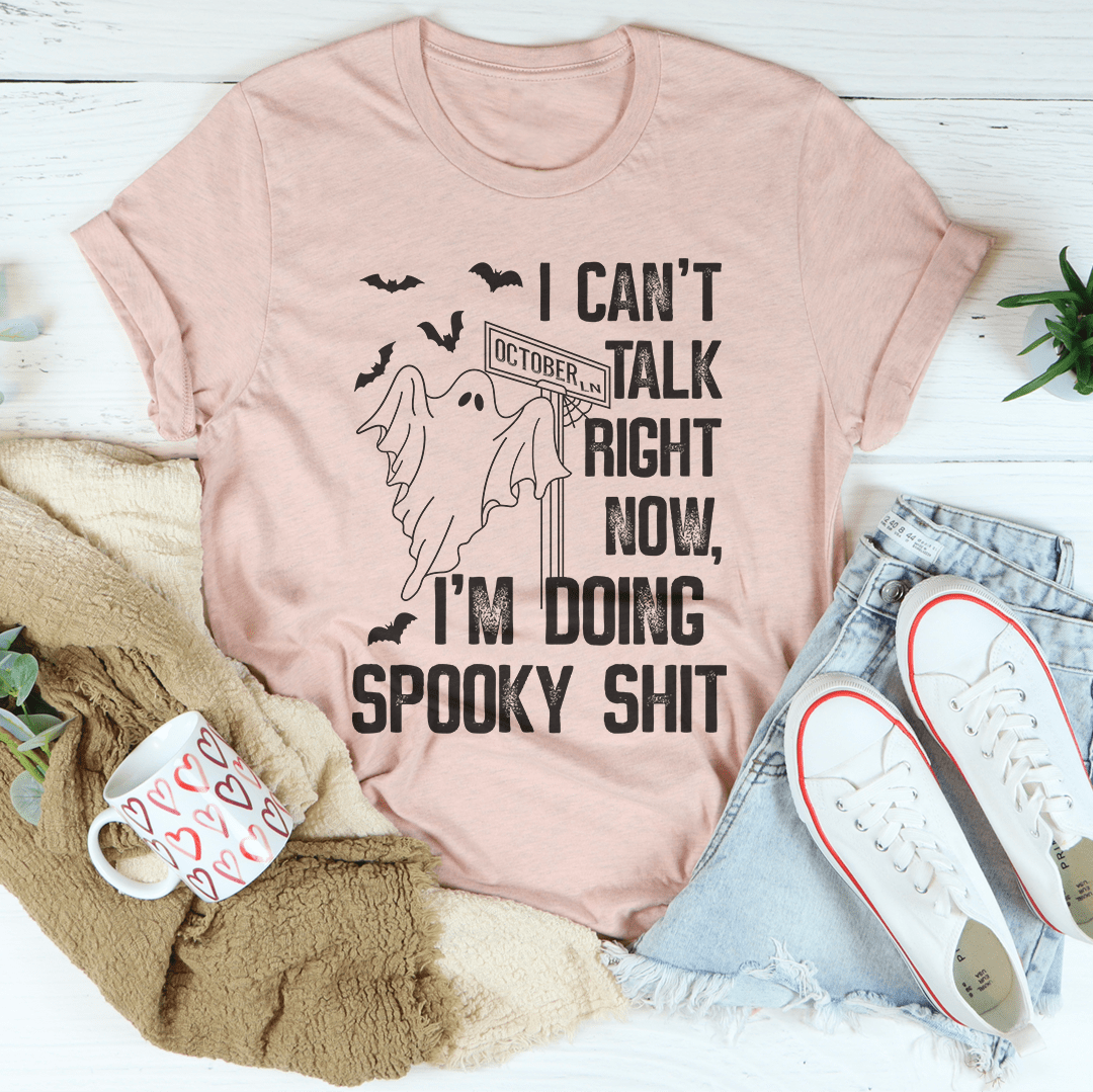 I Can't Talk Right Now Spooky T-Shirt featuring a spooky design on soft cotton fabric, perfect for Halloween or casual wear.