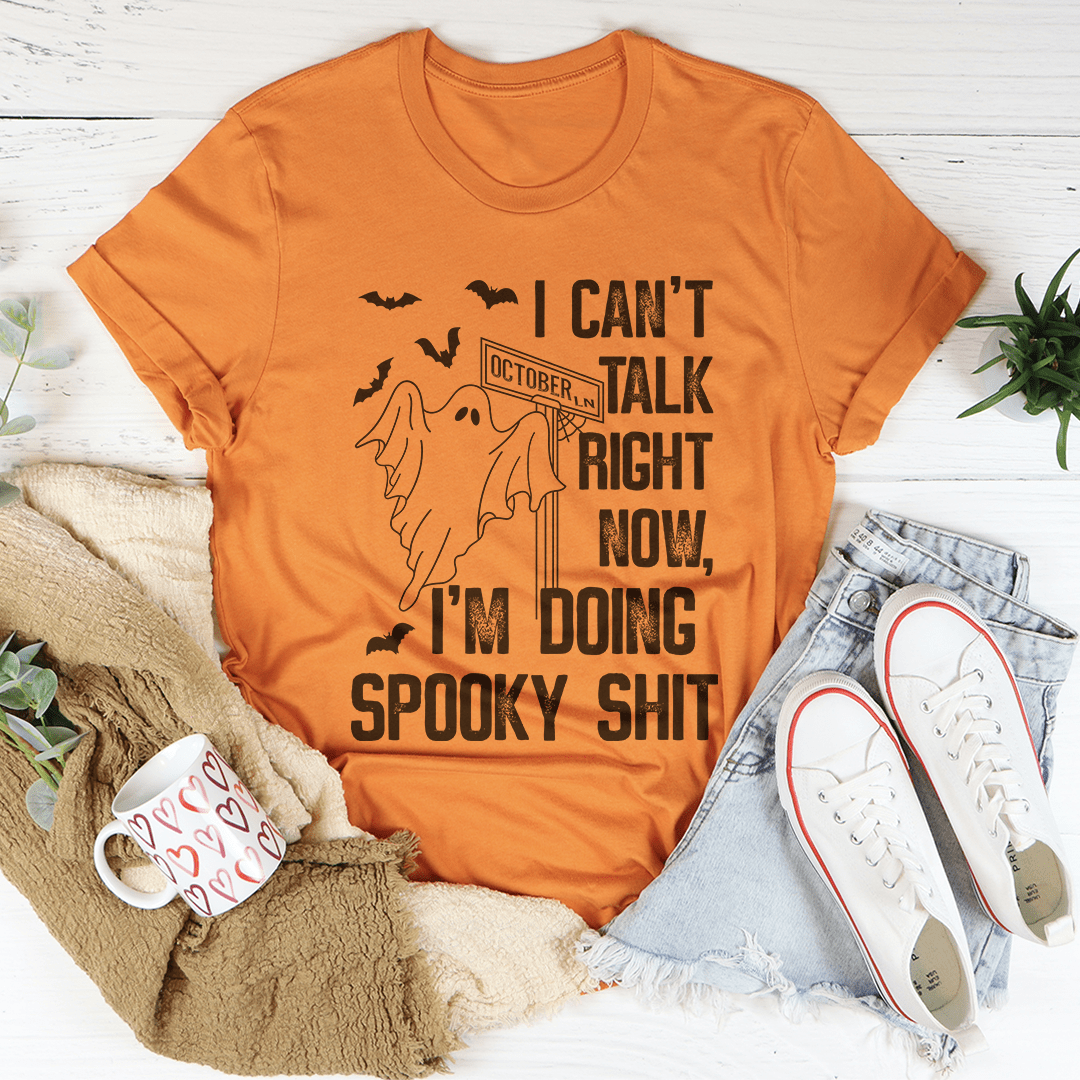 I Can't Talk Right Now Spooky T-Shirt featuring a spooky design on soft cotton fabric, perfect for Halloween or casual wear.