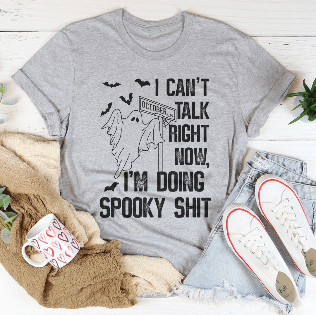 I Can't Talk Right Now Spooky T-Shirt featuring a spooky design on soft cotton fabric, perfect for Halloween or casual wear.